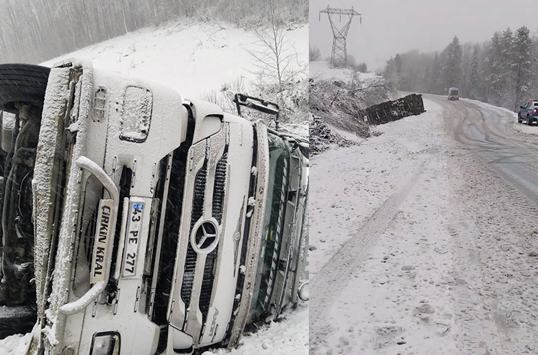 Kayganlaşan yolda TIR devrildi: 2 kişi yaralandı