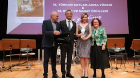 Özel, Türkan Saylan'ı anma programına katıldı