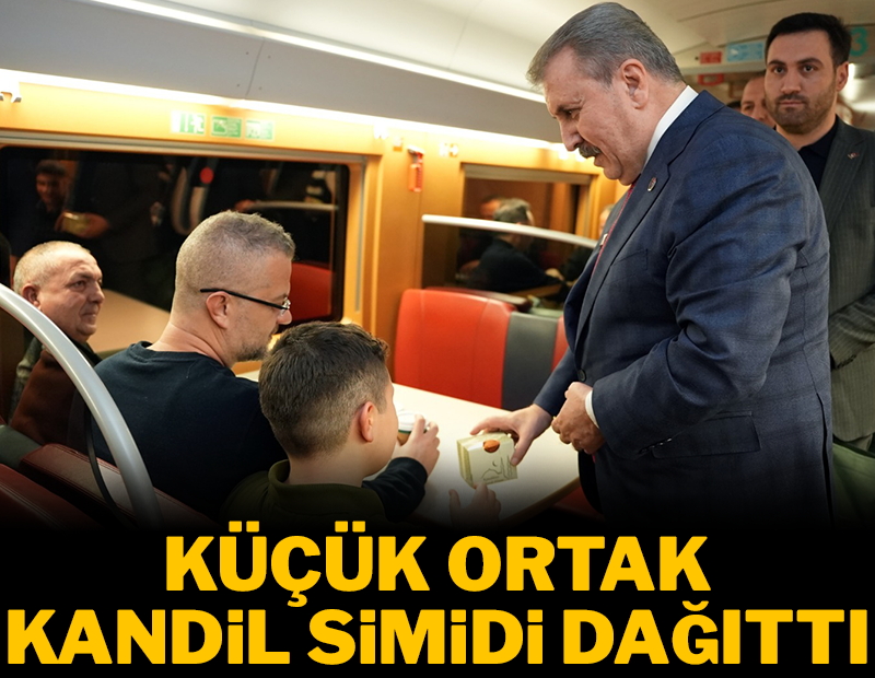 Küçük ortak trene bindi kandil simidi dağıttı