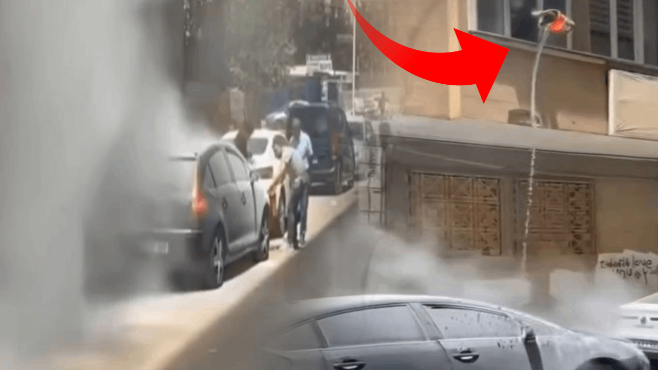 Yanan otomobili evinin penceresinden söndürmeye çalıştı