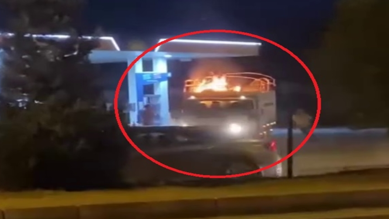 Alev alan kamyonet, akaryakıt istasyonuna girdi
