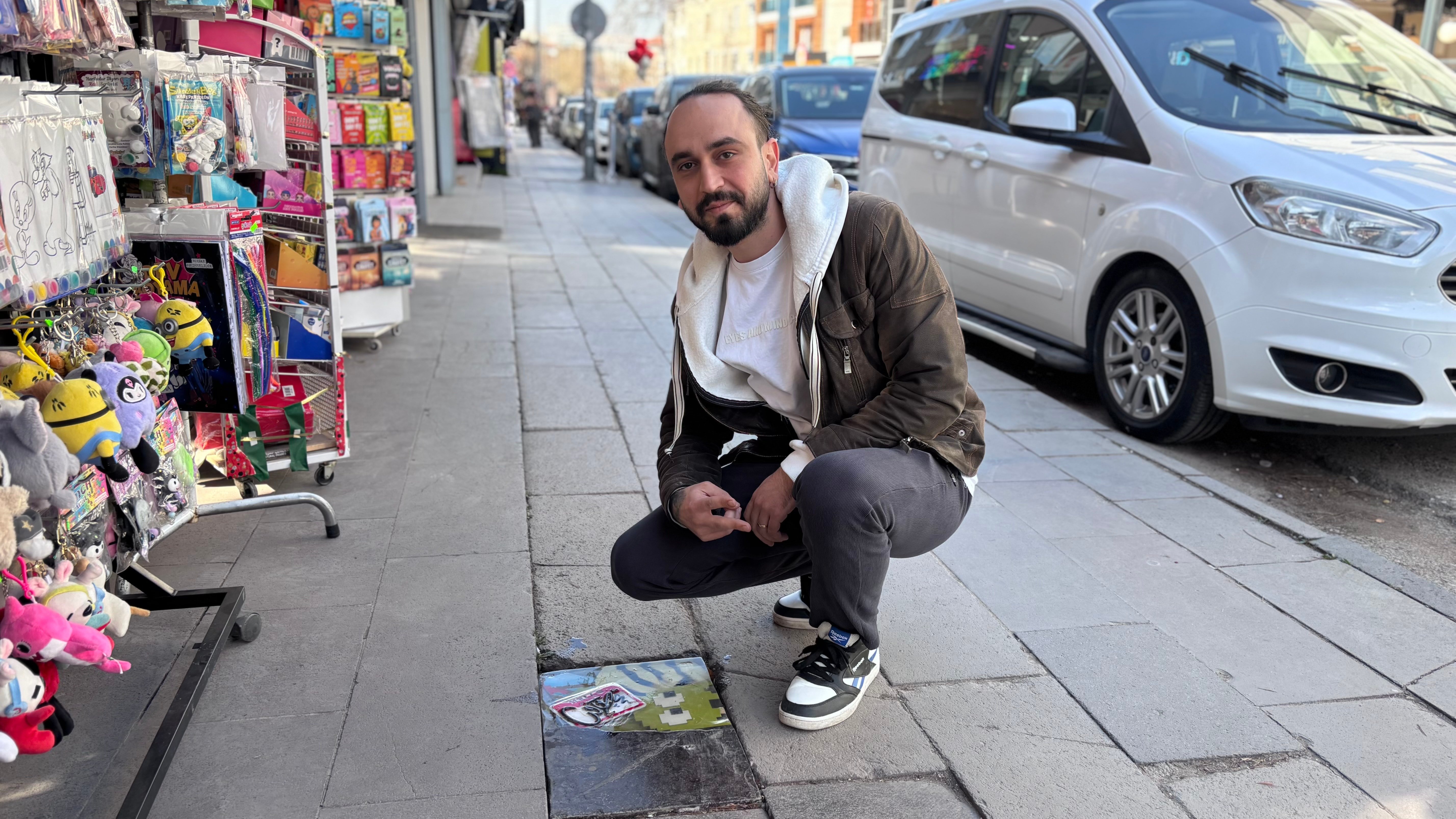 ‘Gri şehri' sanatıyla renklendiriyor