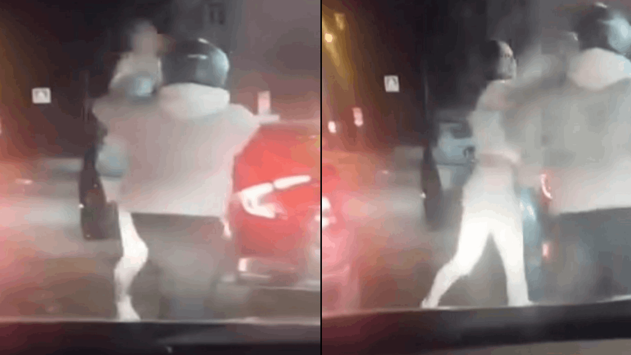 Trafikteki kadın kendisini uyaran motosikletliyi tekme tokat dövdü