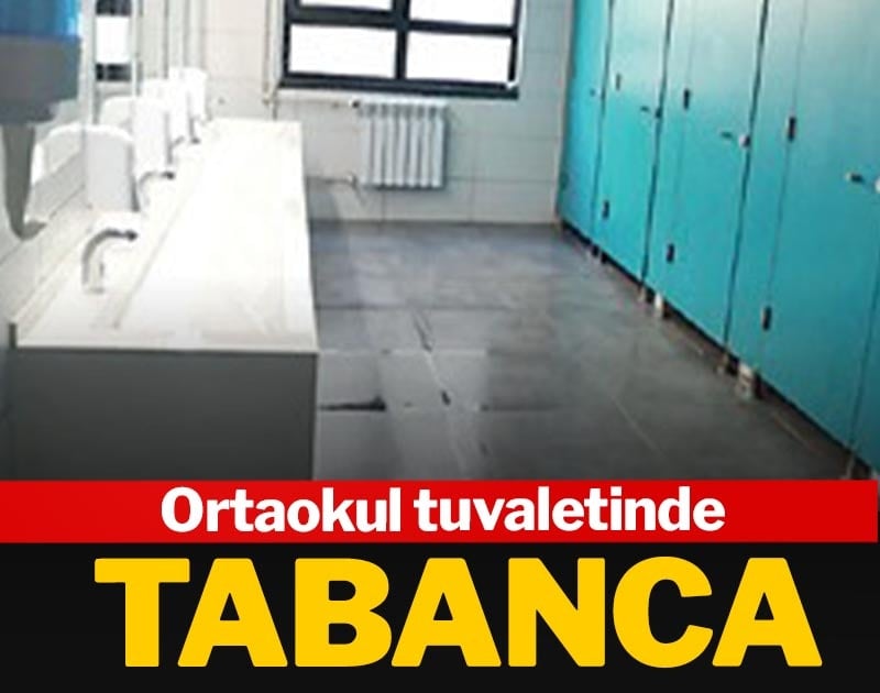 Ortaokul tuvaletinde tabanca