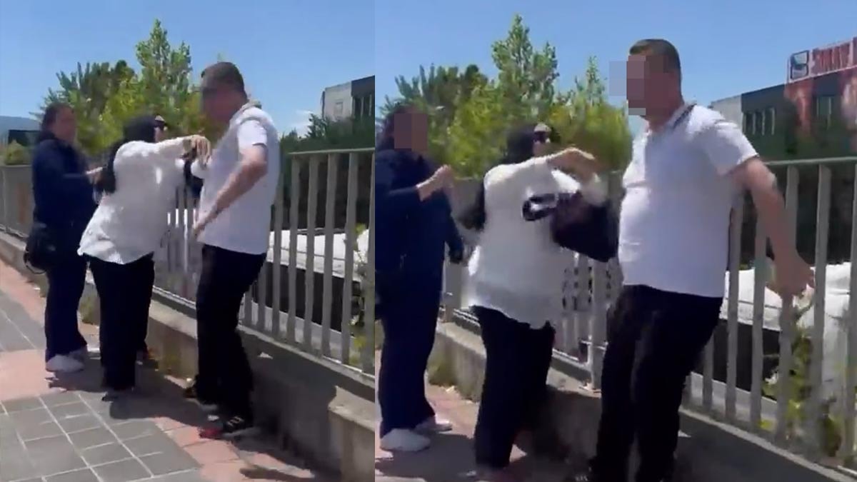 Kadını darbeden erkeği, başka bir kadın iterek uzaklaştırdı