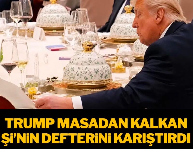 Şi masada kalktığı anda Trump, Şi'nin defterini karıştırdı