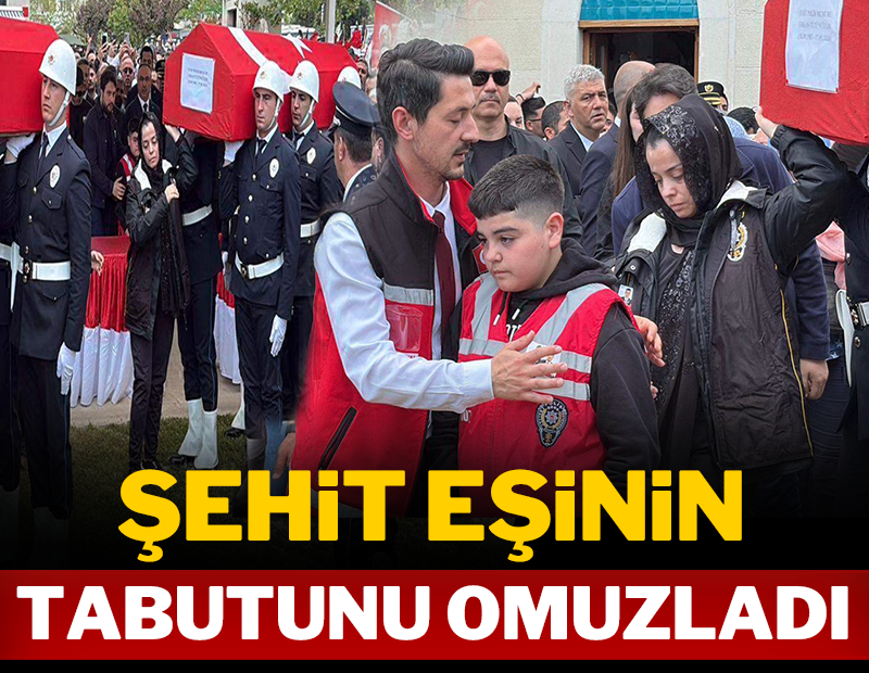 Şehit eşinin tabutunu omuzladı!