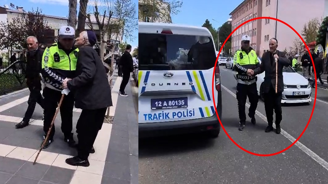 Kendisini yolun karşısına geçiren trafik polisini öptü