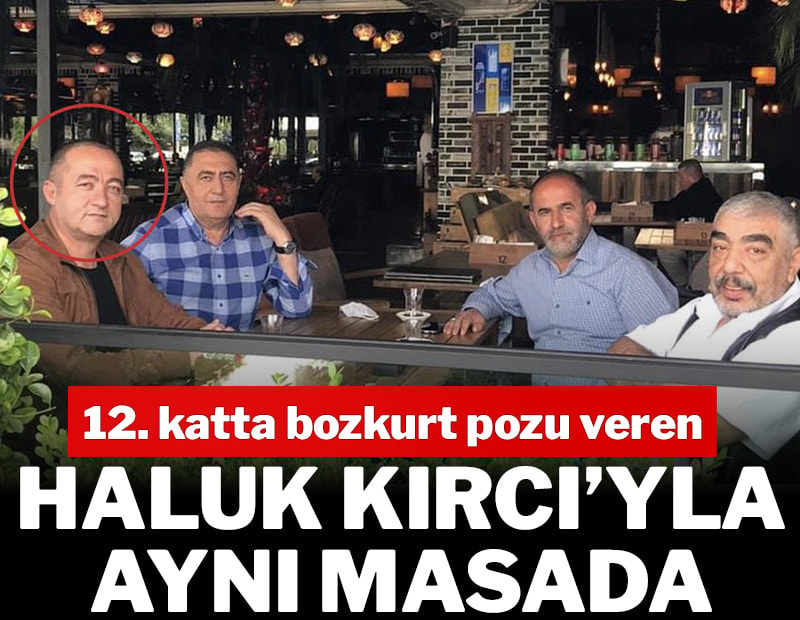 12. katta bozkurt pozu veren Haluk Kırcı’yla aynı masada