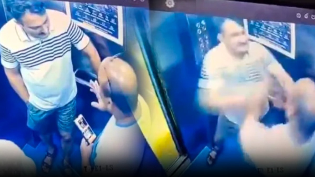 Kameradan habersiz komşular asansörde tekme tokat dövüştü