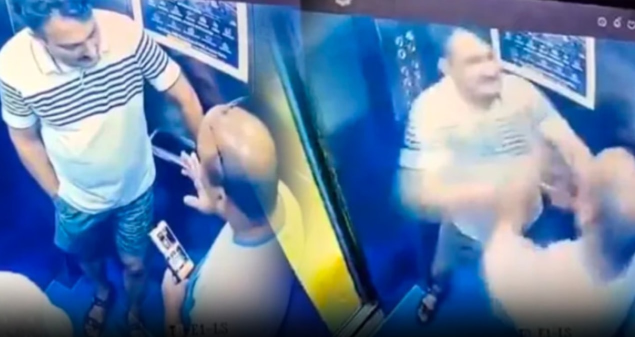 Kameradan habersiz komşular asansörde tekme tokat dövüştü