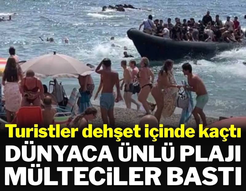Mülteci gemisi dünyaca ünlü plajı bastı: Turistler nereye kaçacaklarını bilemedi