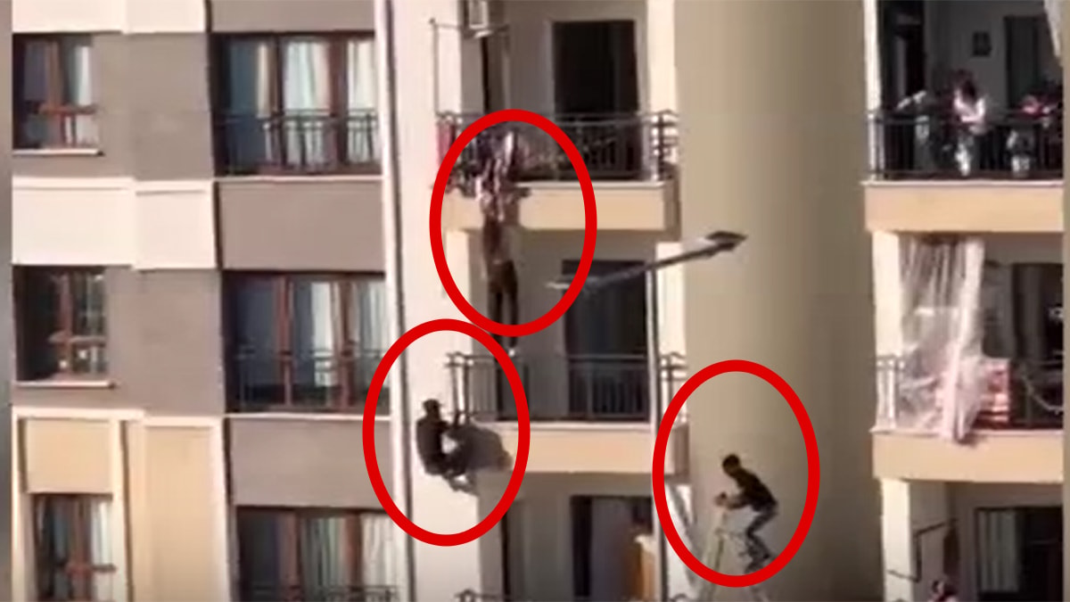 Canını hiçe sayarak balkondan düşmek üzere olan kızı böyle kurtardı